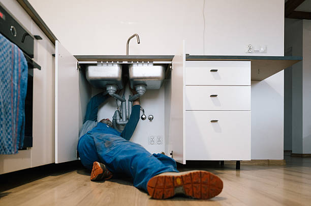 Professional Emergency Plumber technician working in Abington, CT